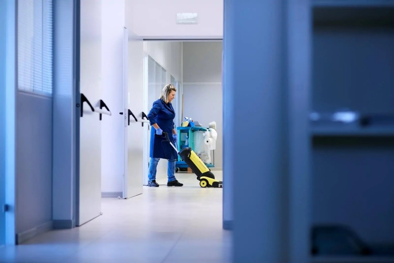 IMG_ Hospital Cleaning Woman cleaning hospital floors.